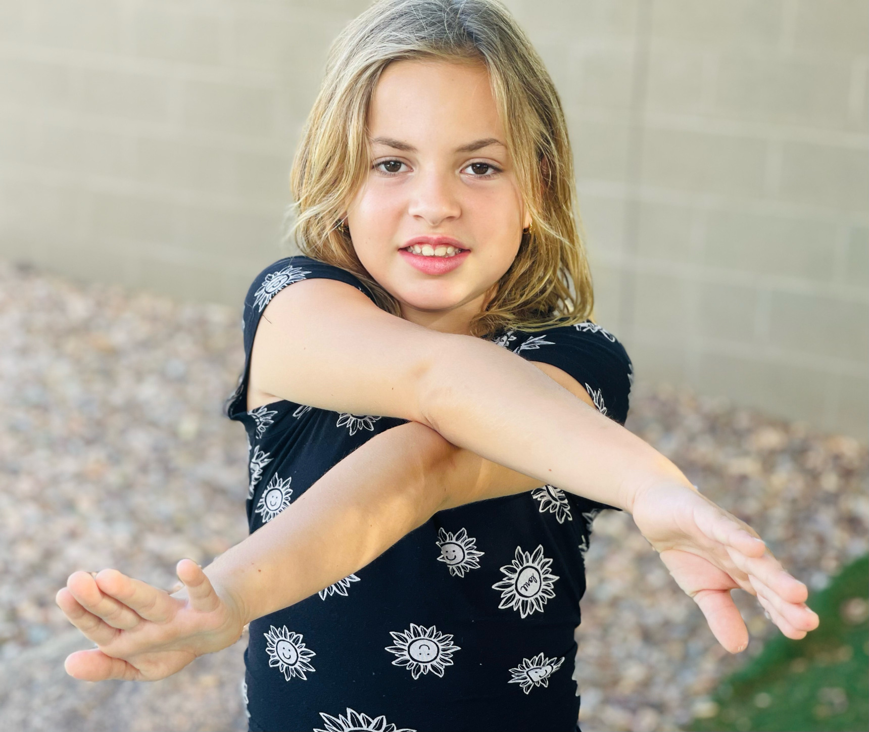 girl crossing the midline of body